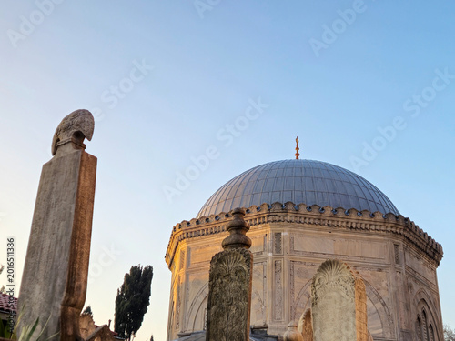 Historic domed mausoleum with stone pillars