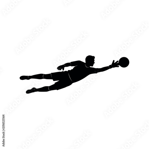 silhouette of a man jumping for ball