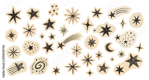 Foto Hand drawn scrapbook star doodles with crayon texture on torn beige paper