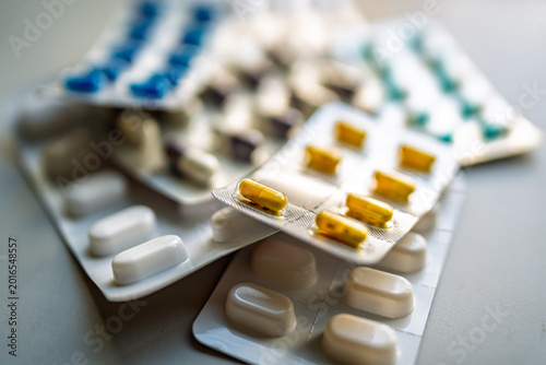 Fotografie Assorted pharmaceutical blister packs with capsules and pills