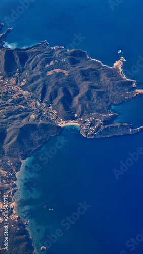 Vertical aerial coastline of Fuengirola and Costa del Sol filmed from airplane