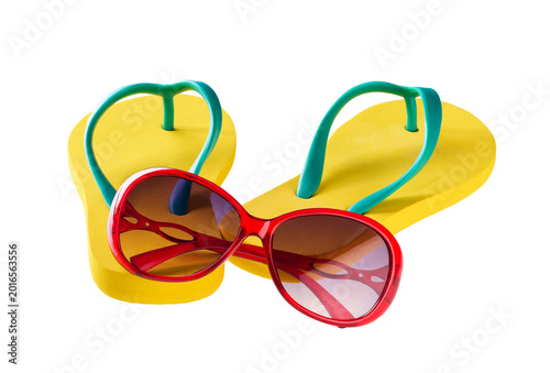 yellow flip-flops with sunglass isolated on white background.