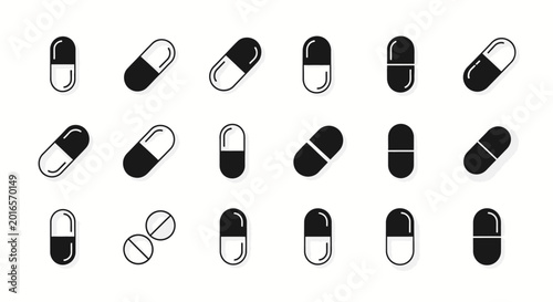 Fotografie Black and white medicine capsules.