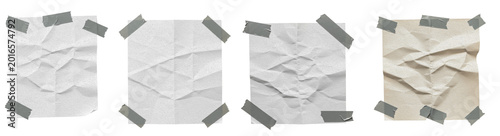 Fotografie Crumpled Square White Paper Scraps Taped with Grey Duct Tape on White Background