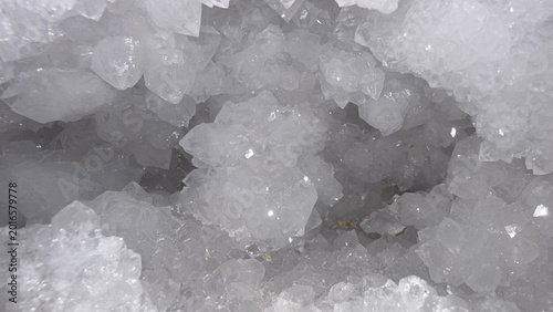 Slika na platnu Close-up texture of clear crystalline formations with sharp reflective facets and natural geometric structure