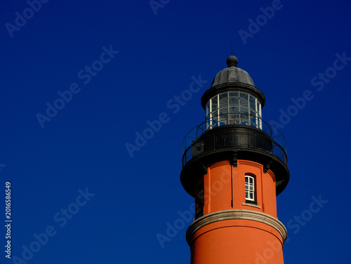 A gorgeous blue sky brings out the beautiful brickwork of the Ponce Inlet Lighthouse south of Daytona Beach Florida