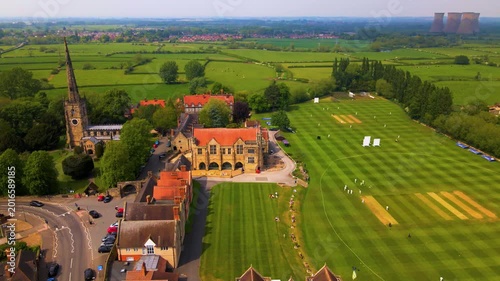 Aerial shot of Repton School cricket match and village landmarks
