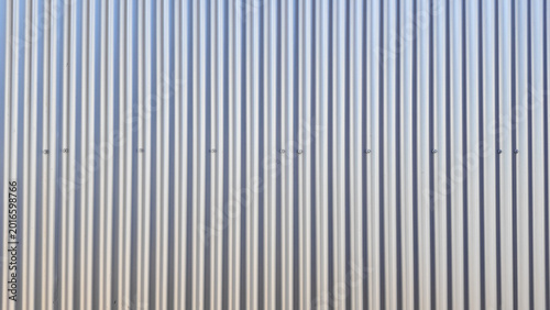 Corrugated metal sheet wall as background pattern