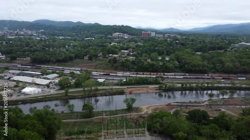 Drone shot flying forward Asheville North Carolina rural area and river