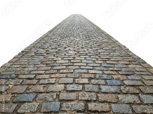 Low-angle shot of a long, converging cobblestone road with gray and brown stones on a white background.