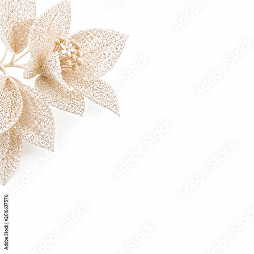 Delicate ivory lace flower in corner on white background with elegant copy space