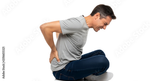 Man sitting with back pain on white background looking down