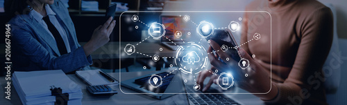 Tableau sur toile Professional team collaborating with digital technology and interconnected netwo