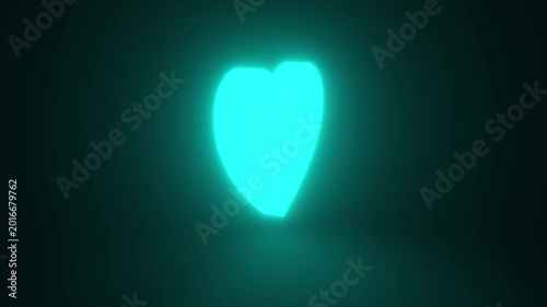 Cyan Heart, Symbol of Love and Valentine's Day Glowing and Rotating on Black Background