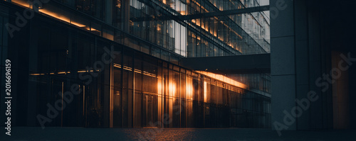Dramatic rim-lit glass facade with deep shadows and warm highlights 32k ultra HD