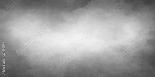 A dark grunge metal background featuring a brushed texture with gray smoke and misty clouds creates a dramatic storm design backdrop