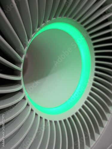 Photography The image shows the top view of a modern air purifier