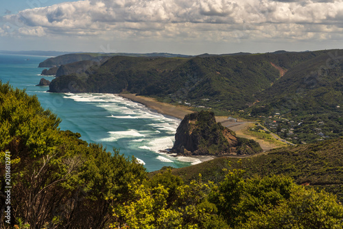 Scenic coastal views of Auckland west coast Piha beach from high above the cliffs on the Mercer bay loop walk