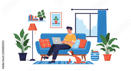 Man sitting on a comfortable blue sofa working on a laptop with his pet dog sitting on the floor nearby at home.