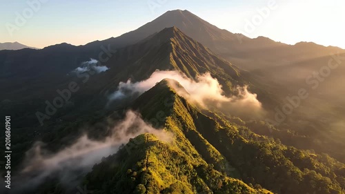 Dramatic Volcanic Mountain in Misty Fog with Dark Atmospheric Clouds