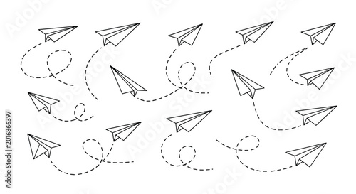 Collection of various paper airplanes flying in different directions with dashed lines showing their winding flight paths on a white background.