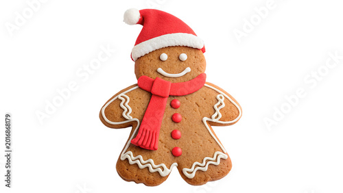 Traditional festive gingerbread man cookie for Christmas holiday celebration and sweet bakery snack concepts isolated on transparent background cut out