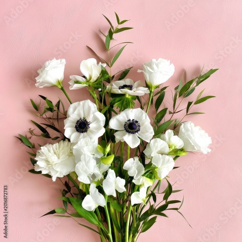 Bouquet of White Flowers With Green Leaves on a Pink Background During Daylight