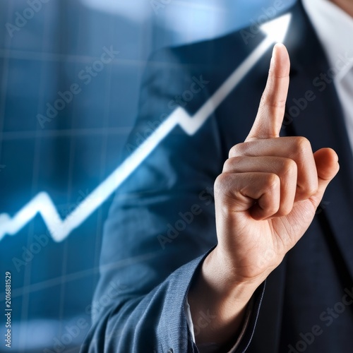 Business Person Shows Rising Graph in Office Setting With Blue Background Dur...