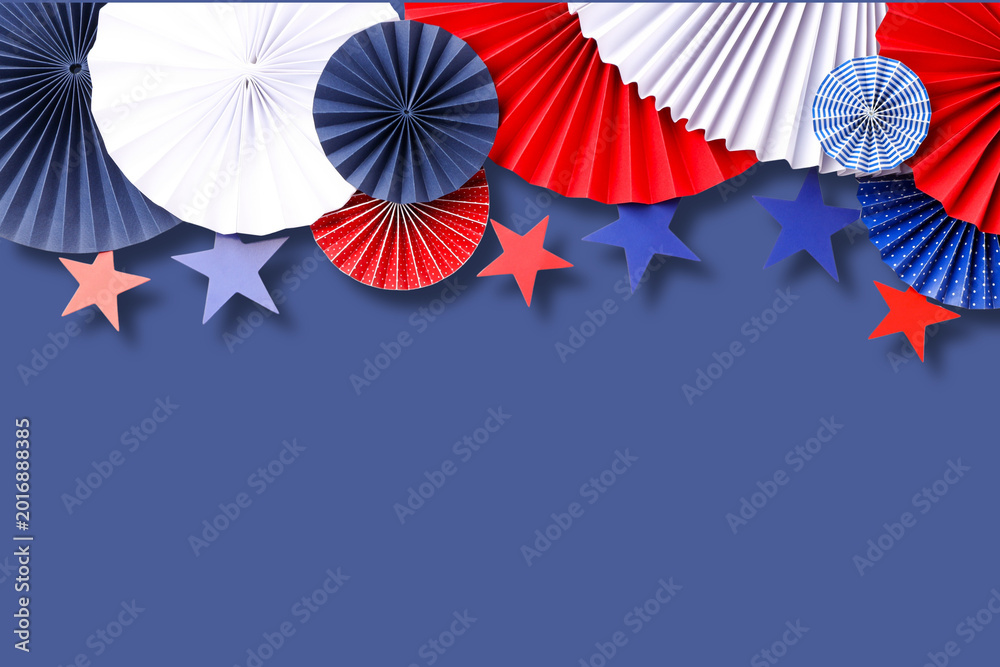 Fototapeta premium Colorful paper decorations in red white and blue for Labor Day
