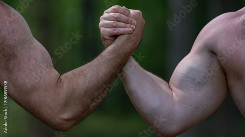 Fotografía Arm wrestling frames physical male challenge