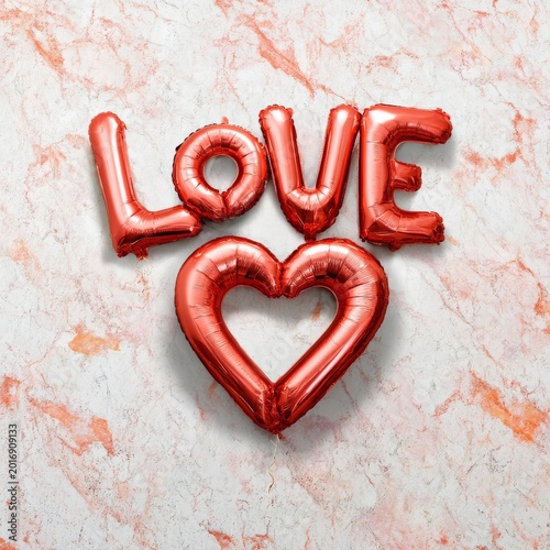 Red Balloons Spell Love on a Marble Surface for a Celebration or Event