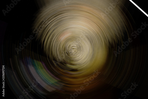 The design of transparent curved light lines on a black background with many colors