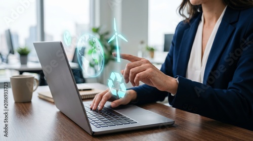 Businesswoman interacting with holographic sustainability icons on laptop. Green energy, renewable technology, and ESG business strategy concept.