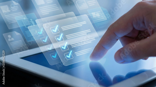 Professional completing digital survey checklist with approval checkmarks on tablet touchscreen interface