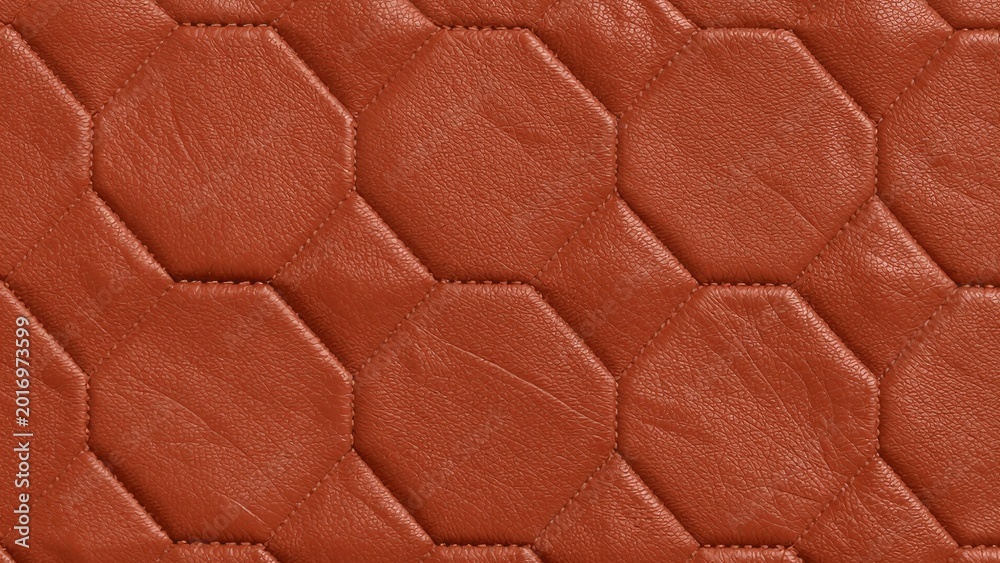 Naklejka premium Close-up of rich brown leather with a quilted hexagonal pattern