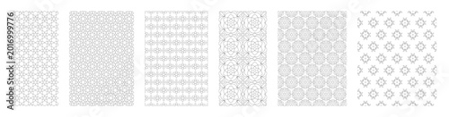 Geometric floral seamless patterns set with linear flowers, buds and petals