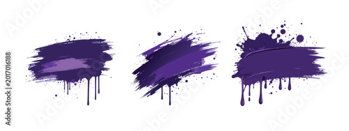 Purple paint brush strokes and splatters on white background