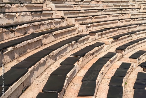 a lot of seats on the play ground floor in the field 