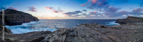Photos Stintino coast at sunset with rugged rock formations