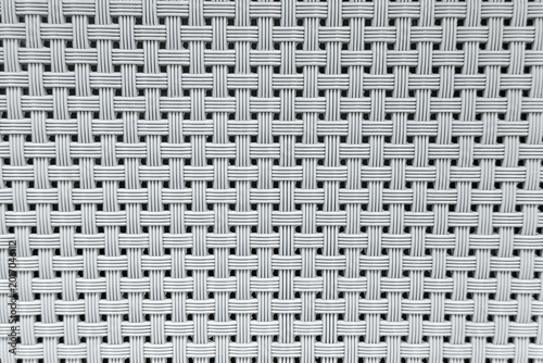 Foto Woven material texture with interlocking strands