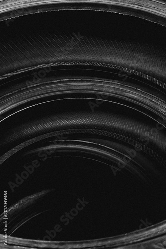 Stacked rubber car tires interior view