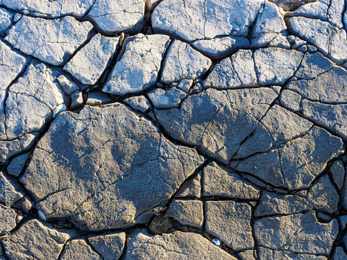 Cuadro en lienzo Cracked earth texture showing drought effects and climate change