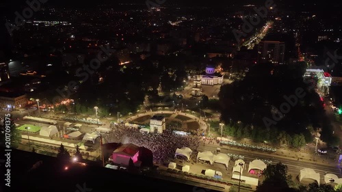 Night aerial panorama of Chisinau city center with Cathedral Park and crowded square