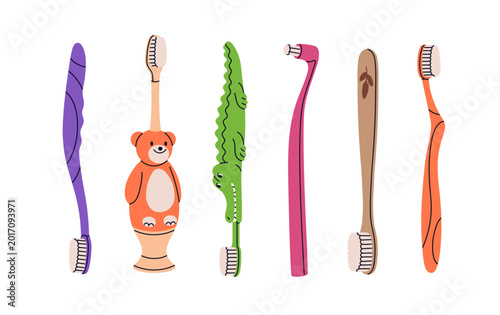 Toothbrushes set. Different manual tooth brushes with kids toys, bamboo and p...