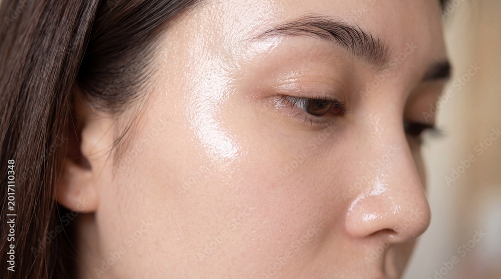 Fototapeta premium Extreme close up glass skin smooth complexion glowing healthy face natural makeup hydrated skin clear pores youthful appearance radiant beauty skincare female serene