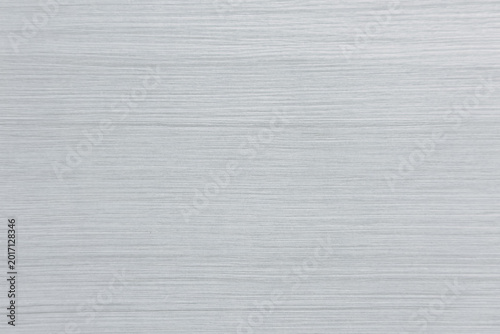 Light gray brushed aluminum metal texture background with horizontal lines
