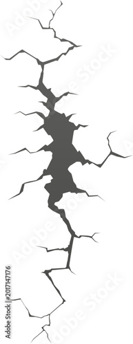 Fotografi Dark fissure splitting a surface, representing damage, crisis, or an earthquake