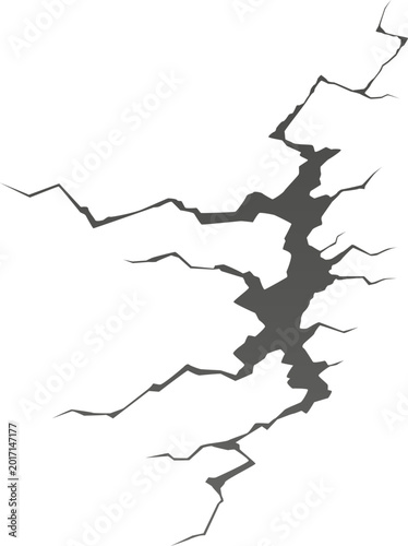 Fotografie Deep jagged crack splitting a surface, representing destruction and structural p