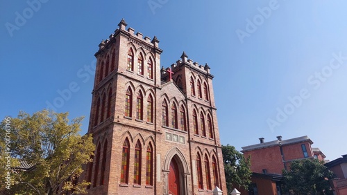 Photography Historic cathedral building under clear blue sky