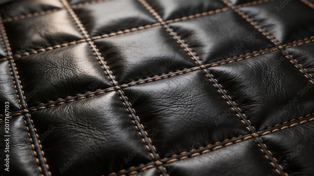 Fototapeta premium Closeup of quilted leather texture emphasizing fluid motion and vibrant color palettes
